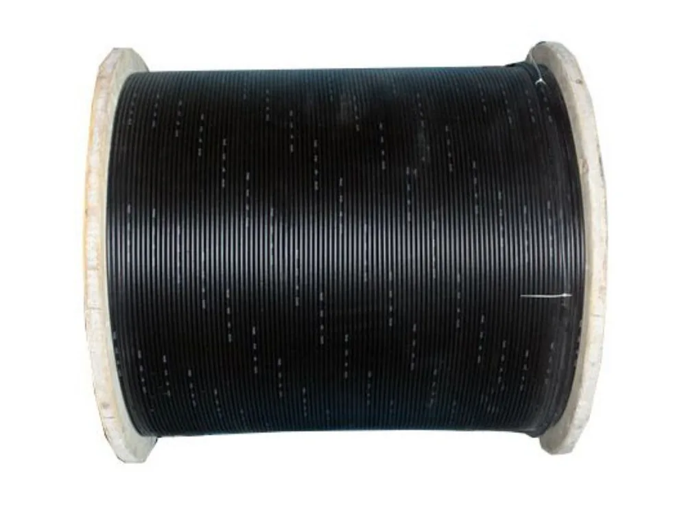 Cuộn cáp quang GYXTW vỏ đen quấn trên rulo gỗ, ảnh trên trang OM3 GYXTW của KCO